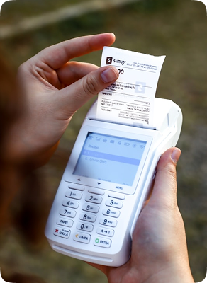 A card terminal printing a receipt
