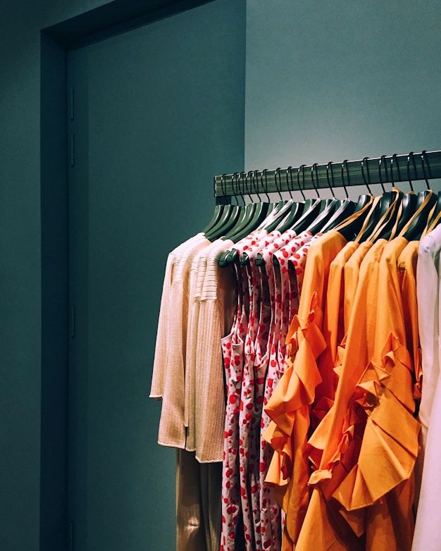 A clothing rail of garments in a fashion store